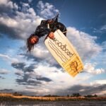 Kitesurfer doing freestyle on Woodboard Trash